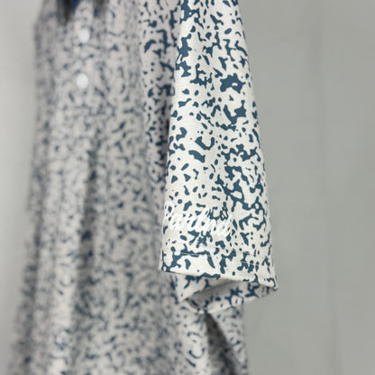 Floral patterned shirt with a plain background