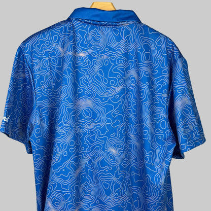 Blue patterned shirt on a mannequin against a white background